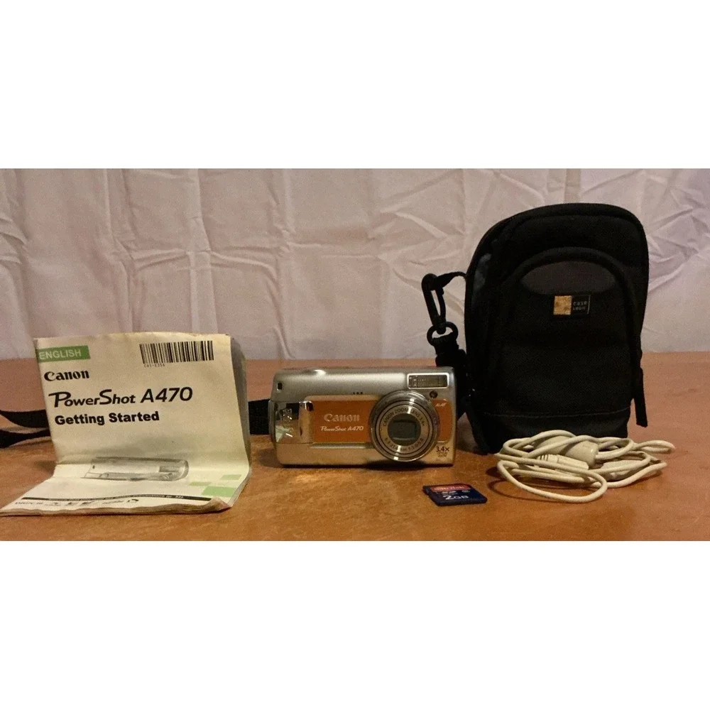 Canon PowerShot A470 7.1MP Digital Camera With Memory Card, Cord And Carry Case